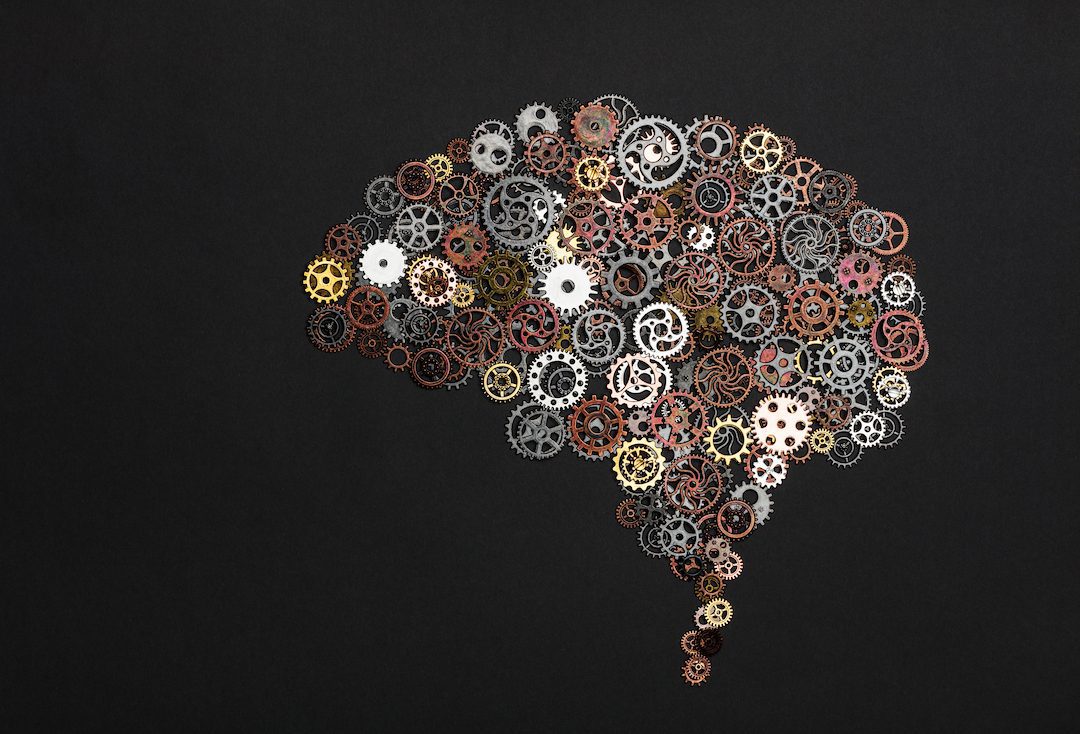 Brain image made out of little cogwheels. Brainwork. Creativity concept.
