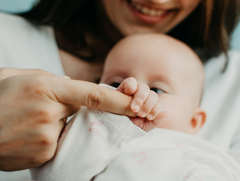 mother holding a newborn