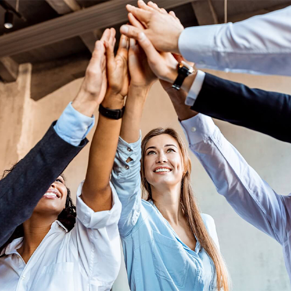 business people slapping hands